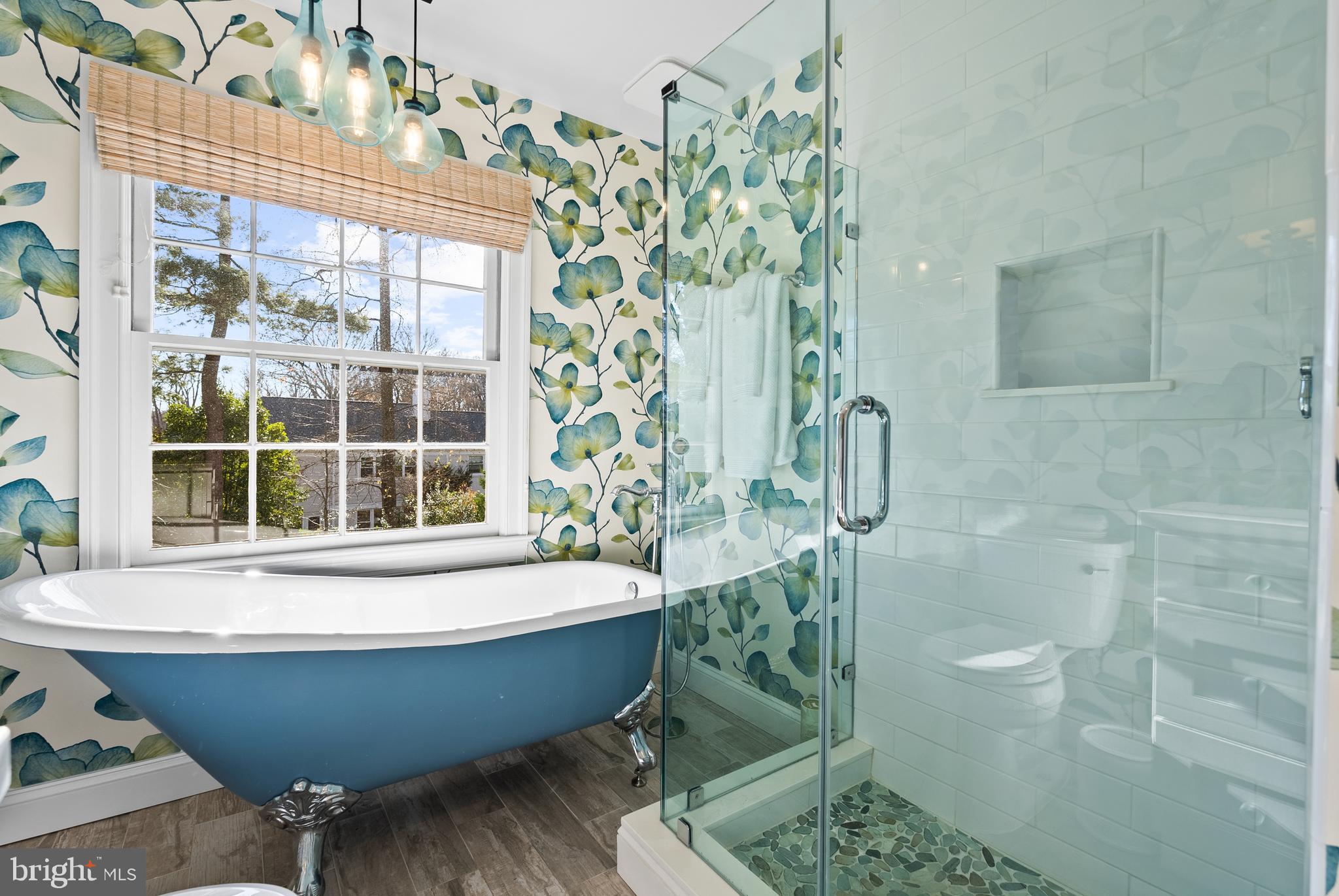 1101 Gatewood Drive Alexandria, VA 22307 - Photo 47 of 63 a large tub sitting in a bathroom next to a window