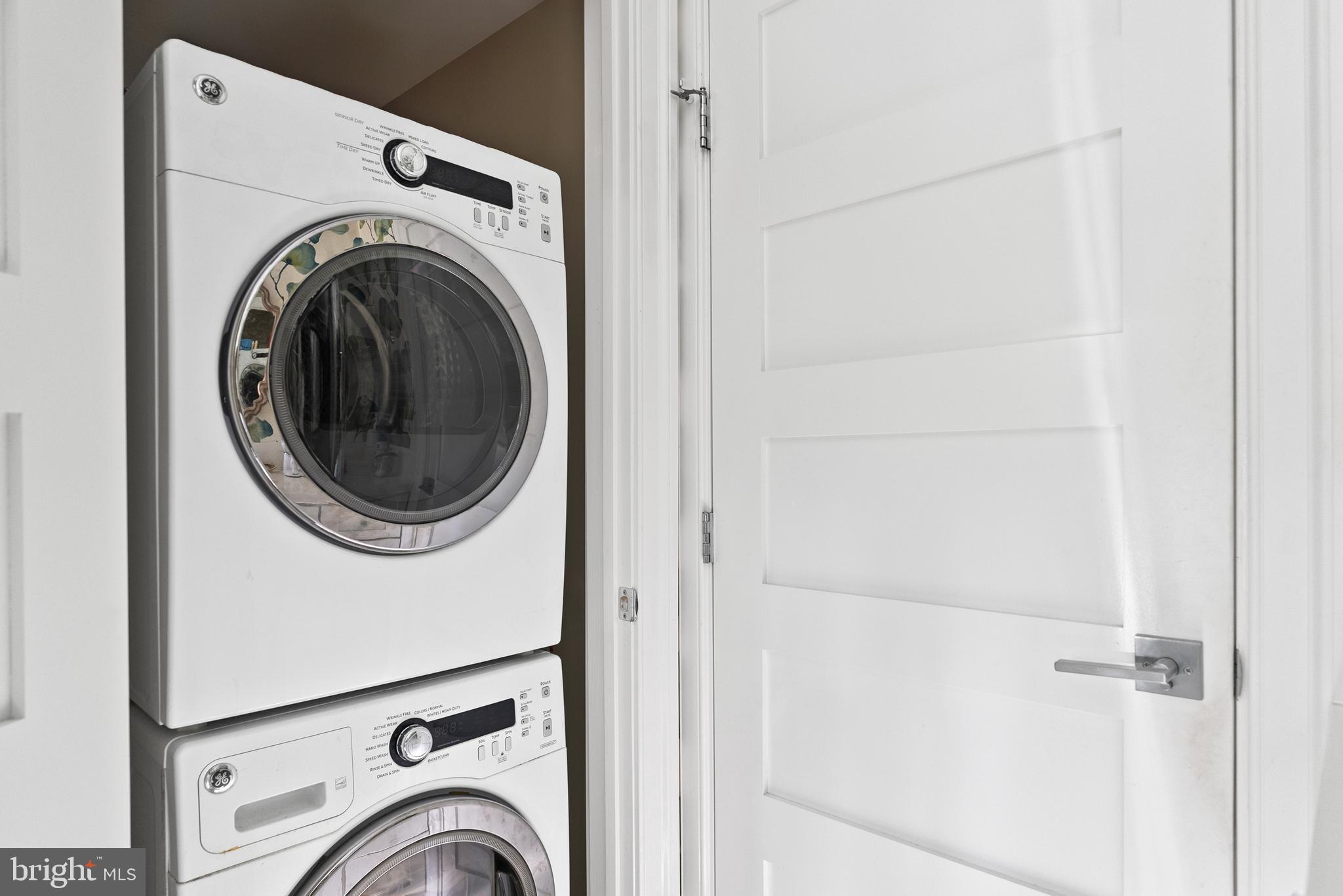 1101 Gatewood Drive Alexandria, VA 22307 - Photo 49 of 63 a view of a hallway with washer and dryer