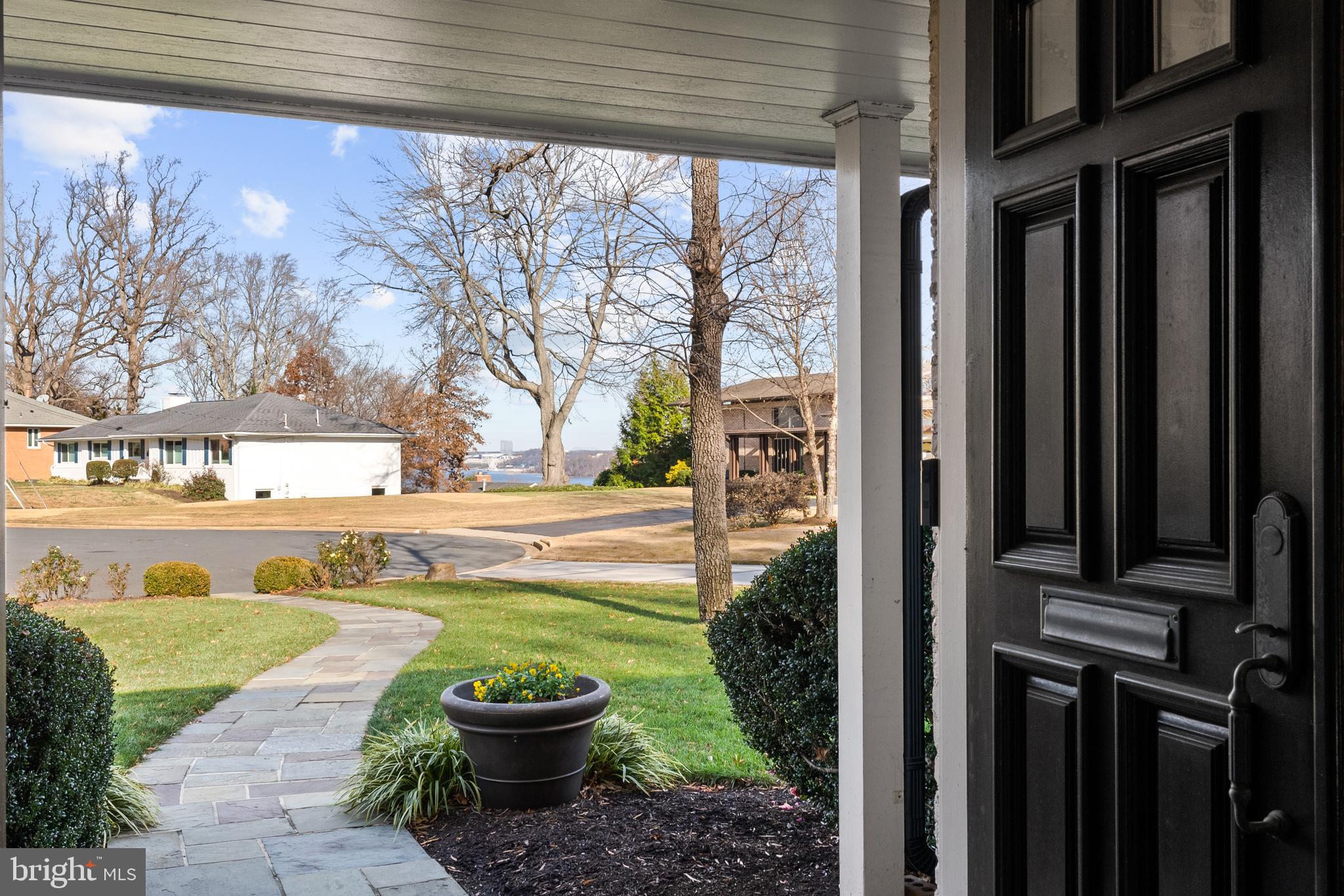 1101 Gatewood Drive Alexandria, VA 22307 - Photo 5 of 63 a view of a back yard of the house with a fountain