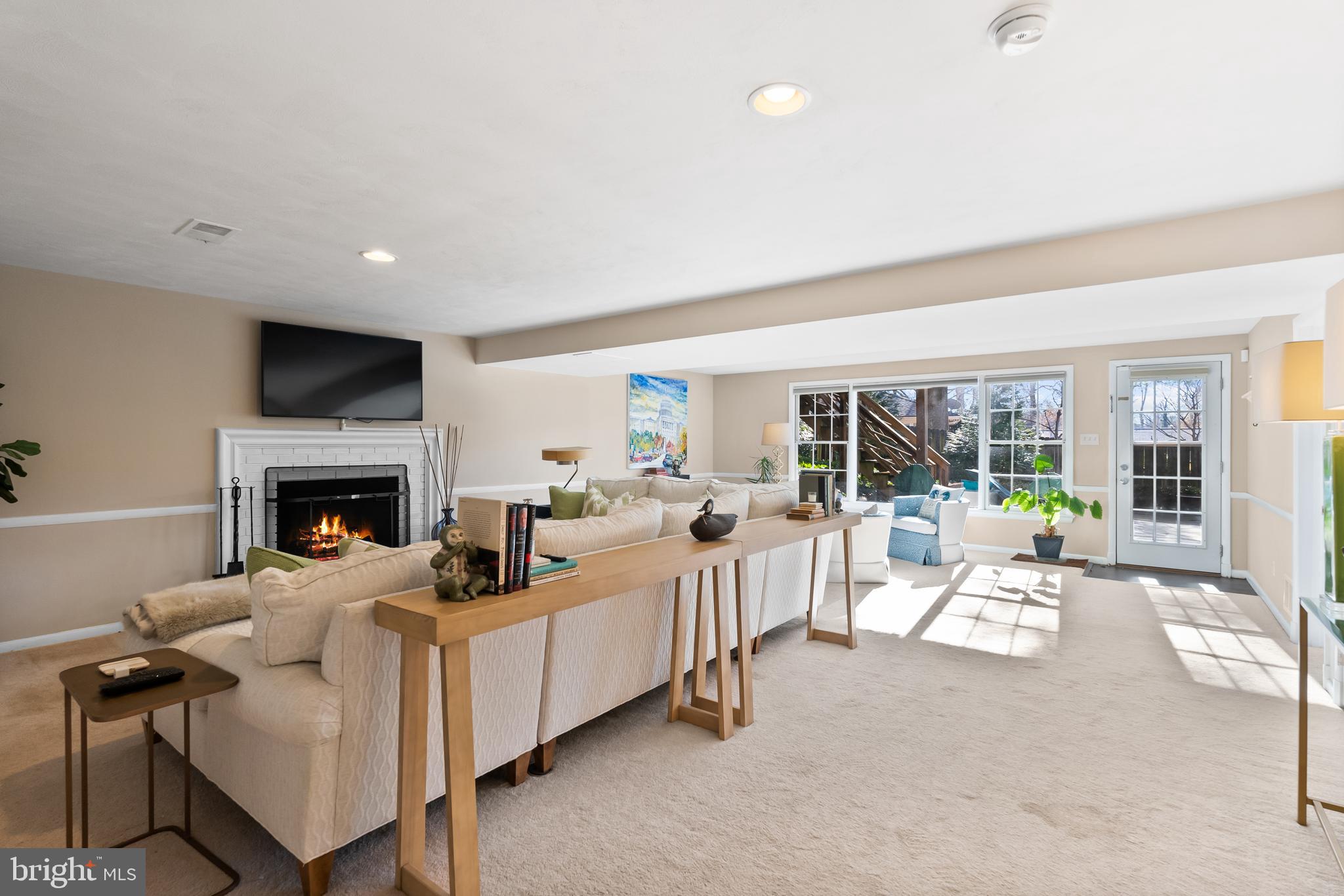 1101 Gatewood Drive Alexandria, VA 22307 - Photo 52 of 63 a living room with furniture and a fireplace