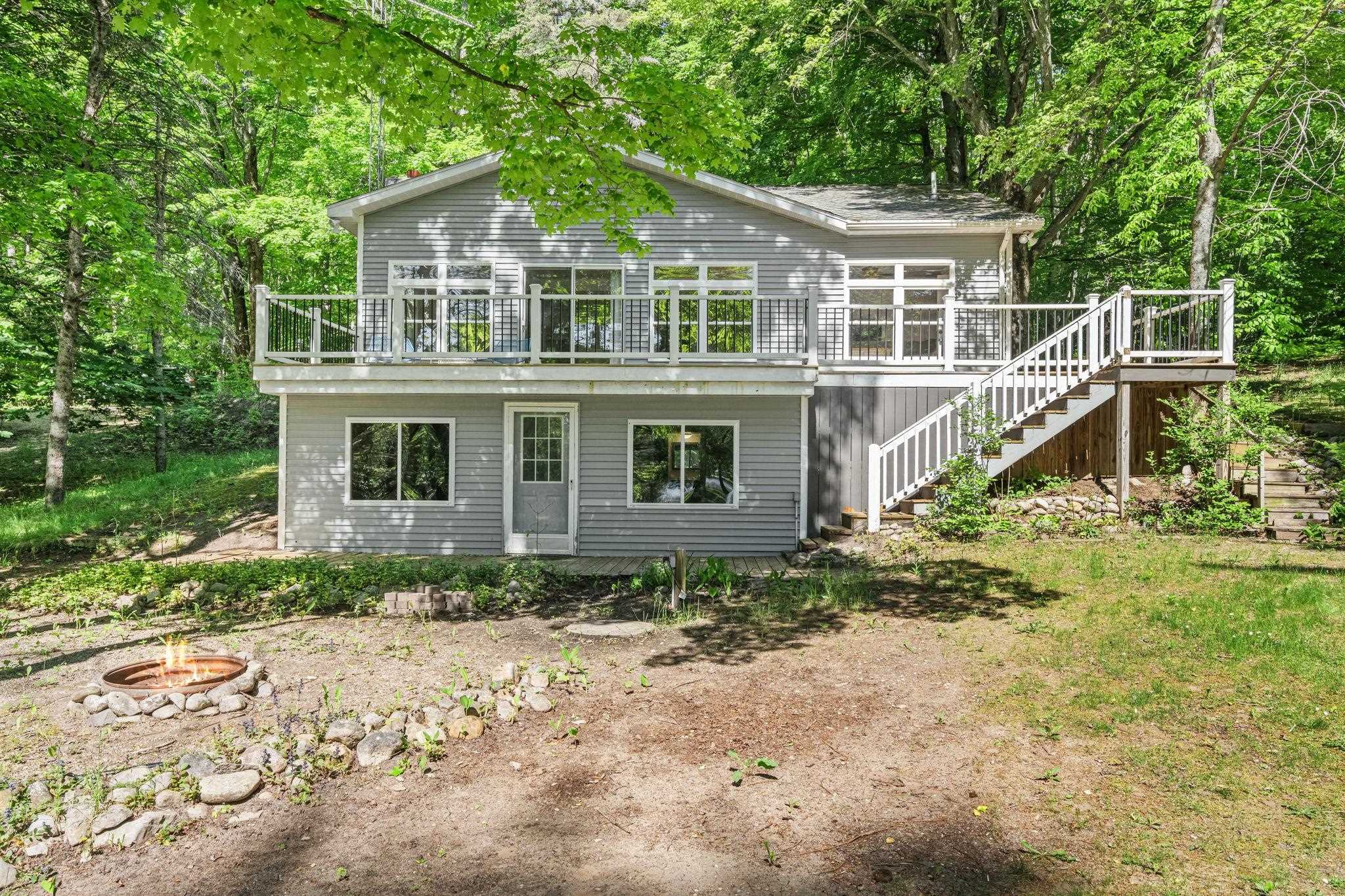 5252 6 Mile Lake Road Ellsworth, MI 49729 - Photo 1 of 76