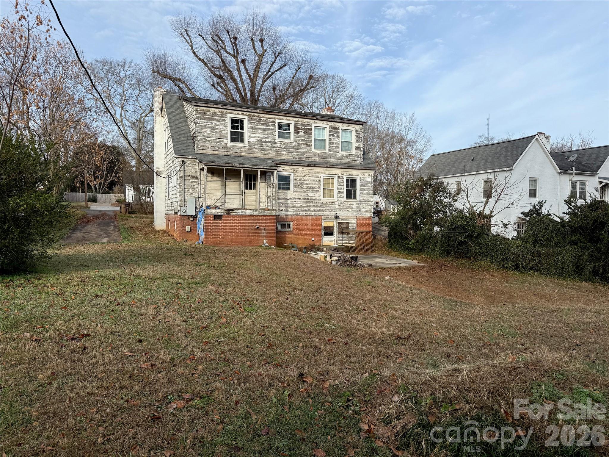 104 Brookhill Road Shelby, NC 28150 - Photo 3 of 40 a front view of a house with a yard