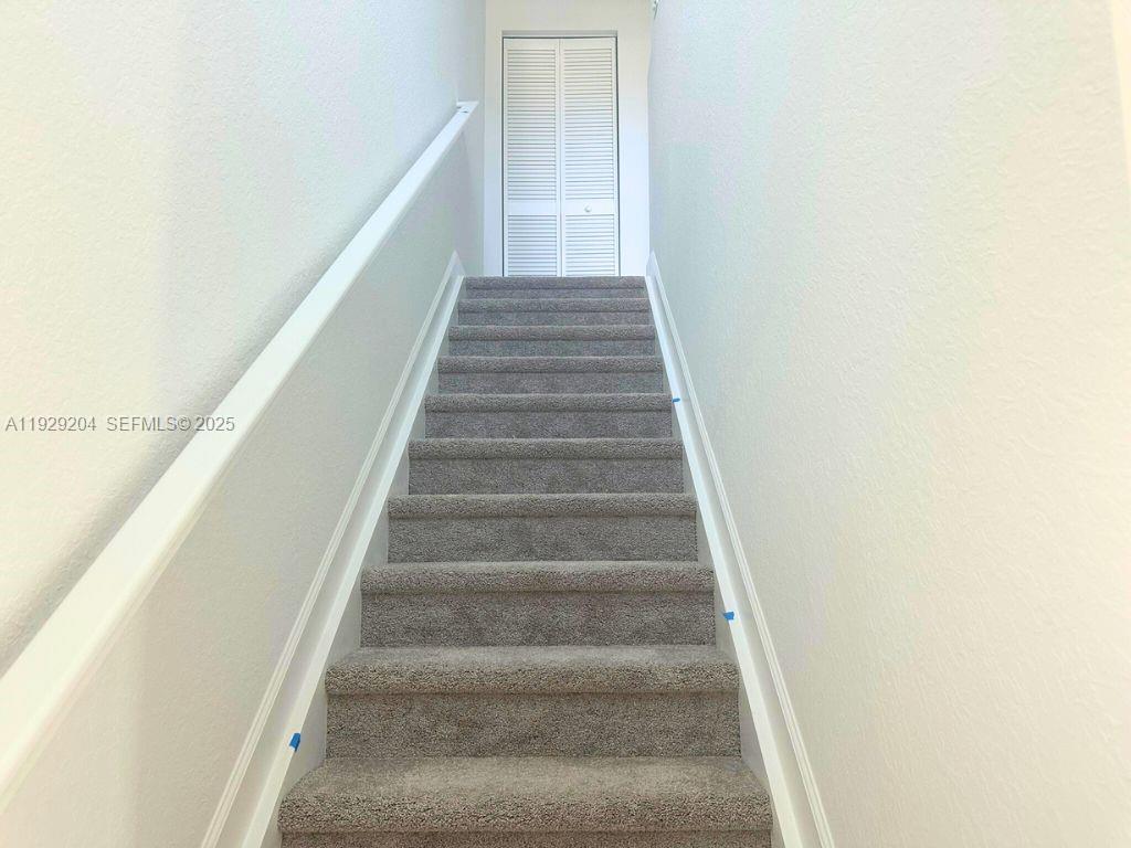 393 Southeast Crossoak Lane Port St. Lucie, FL 34984 - Photo 4 of 10 a view of entryway