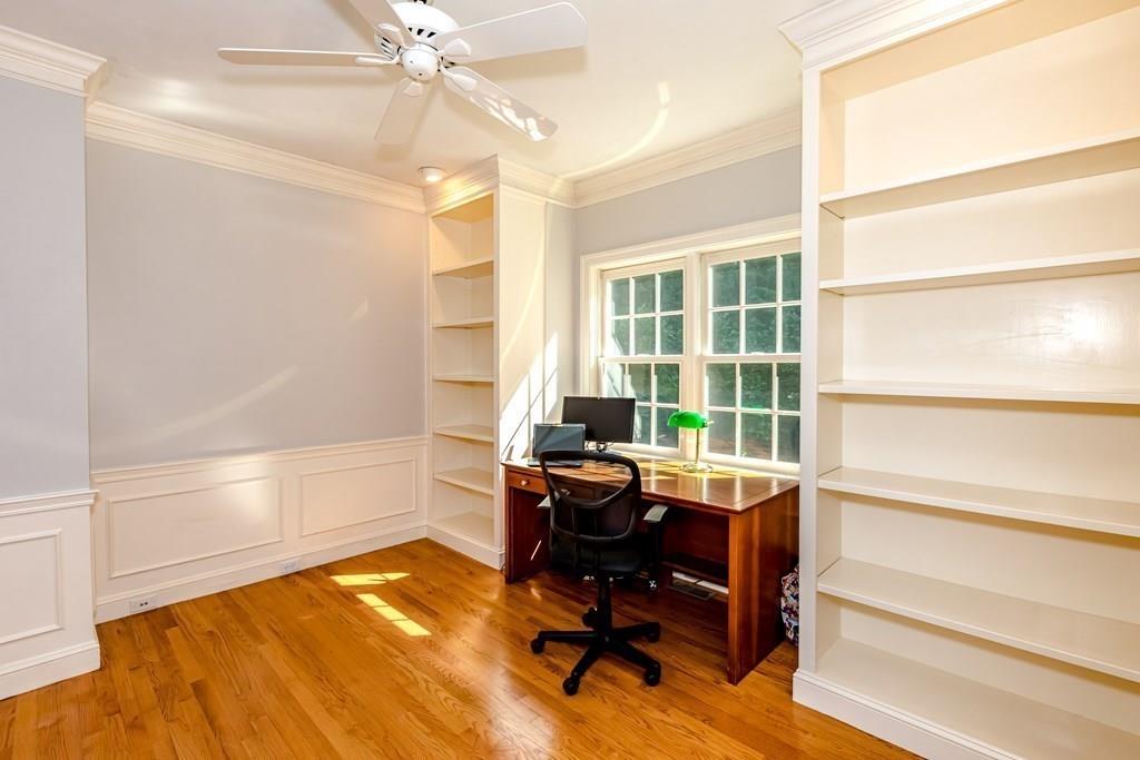 38 Bowditch Road Sudbury, MA 01776 - Photo 16 of 42 a view of a workspace with furniture and a window