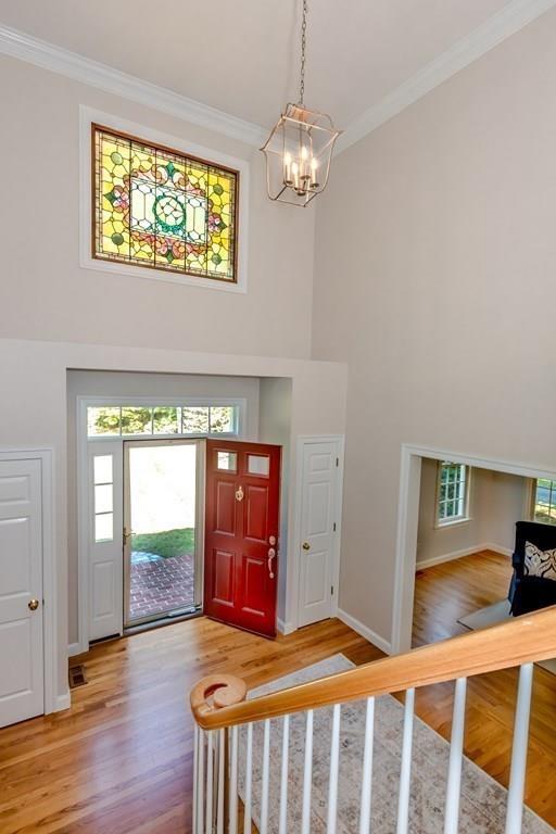 38 Bowditch Road Sudbury, MA 01776 - Photo 19 of 42 a bedroom with a bed and a window