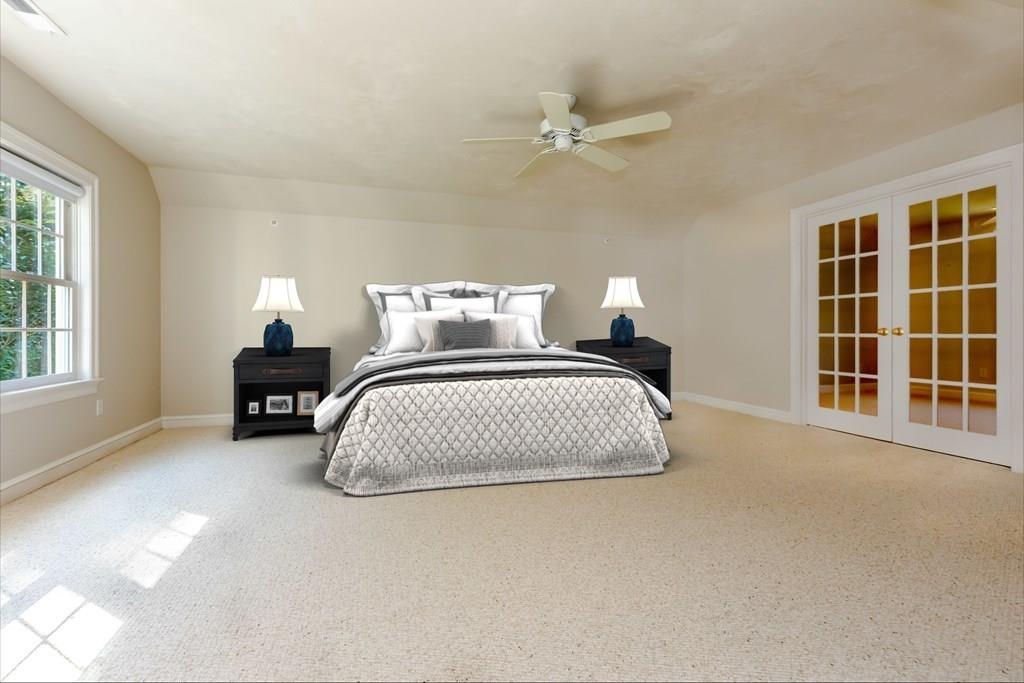 38 Bowditch Road Sudbury, MA 01776 - Photo 21 of 42 a bedroom with a bed and a window