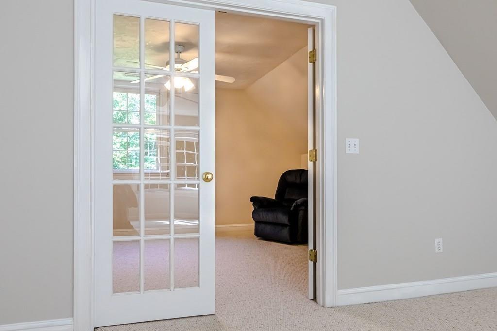 38 Bowditch Road Sudbury, MA 01776 - Photo 23 of 42 a room that has a dresser and a window