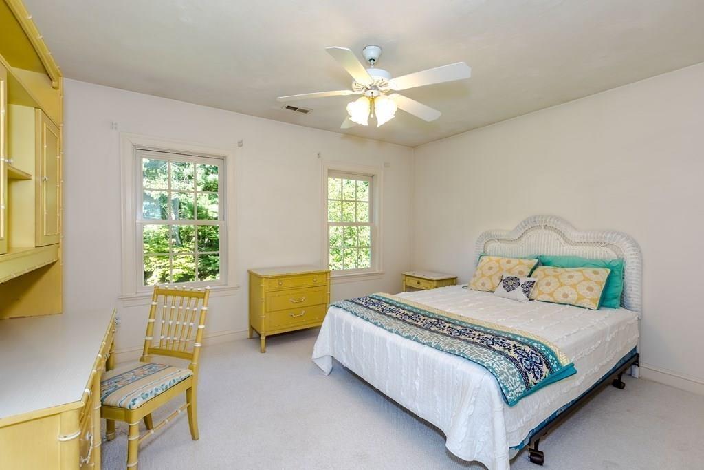 38 Bowditch Road Sudbury, MA 01776 - Photo 28 of 42 a bedroom with a bed and a window