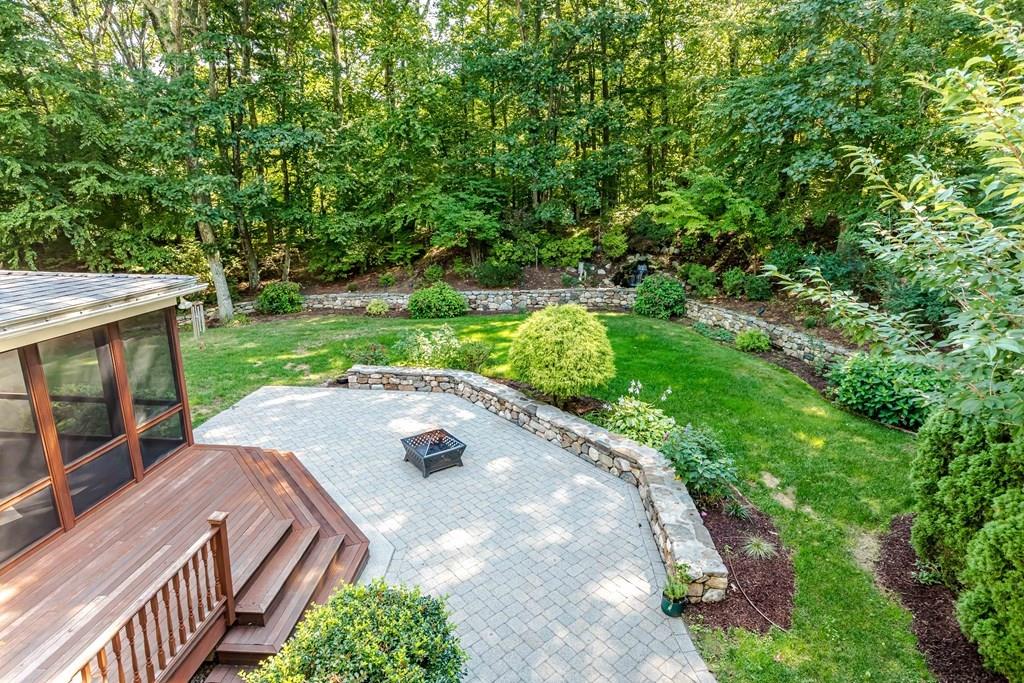 38 Bowditch Road Sudbury, MA 01776 - Photo 3 of 42 a view of a patio with a yard