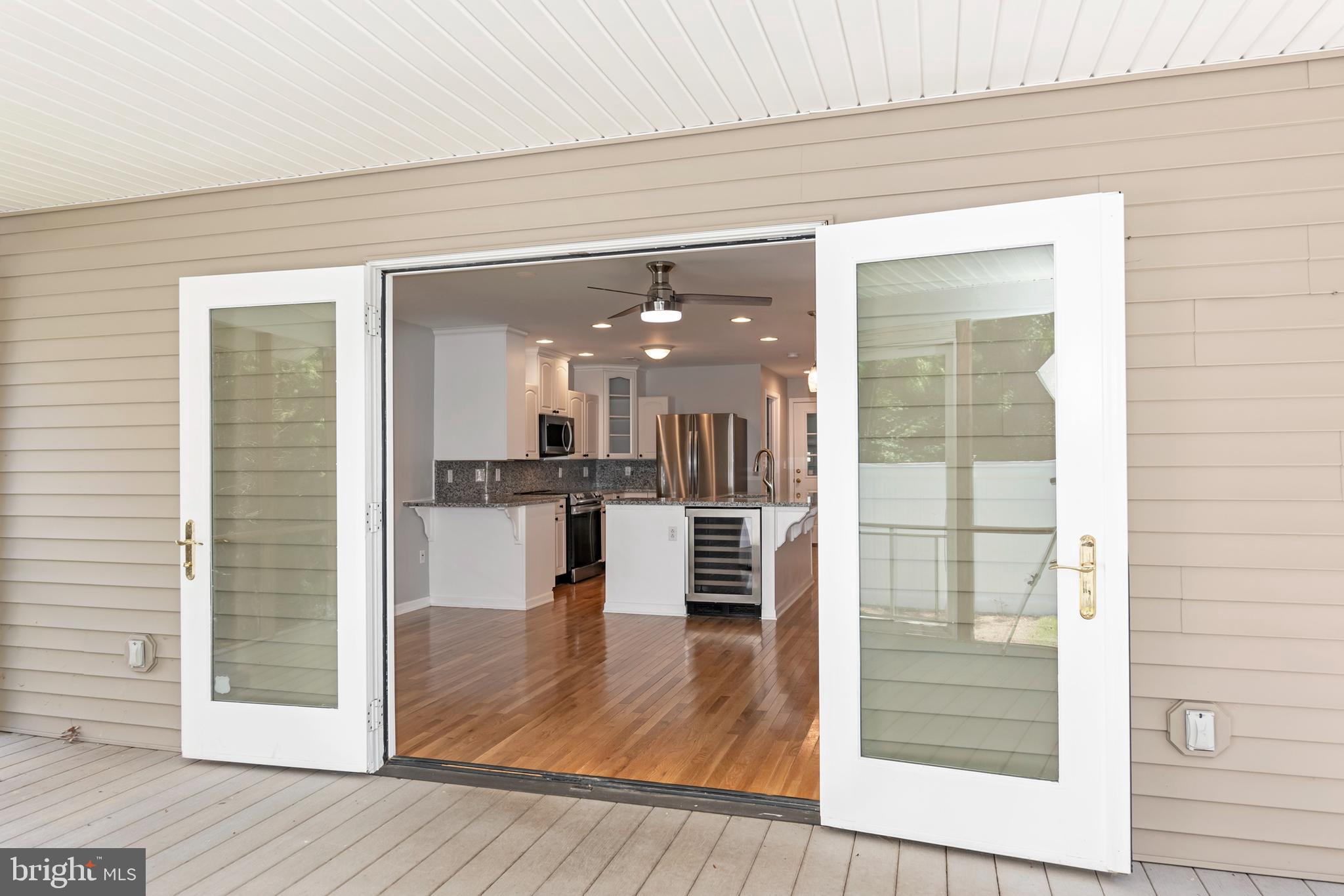 6824 Hopkins Neck Road Easton, MD 21601 - Photo 15 of 45 a view of a kitchen from the hallway