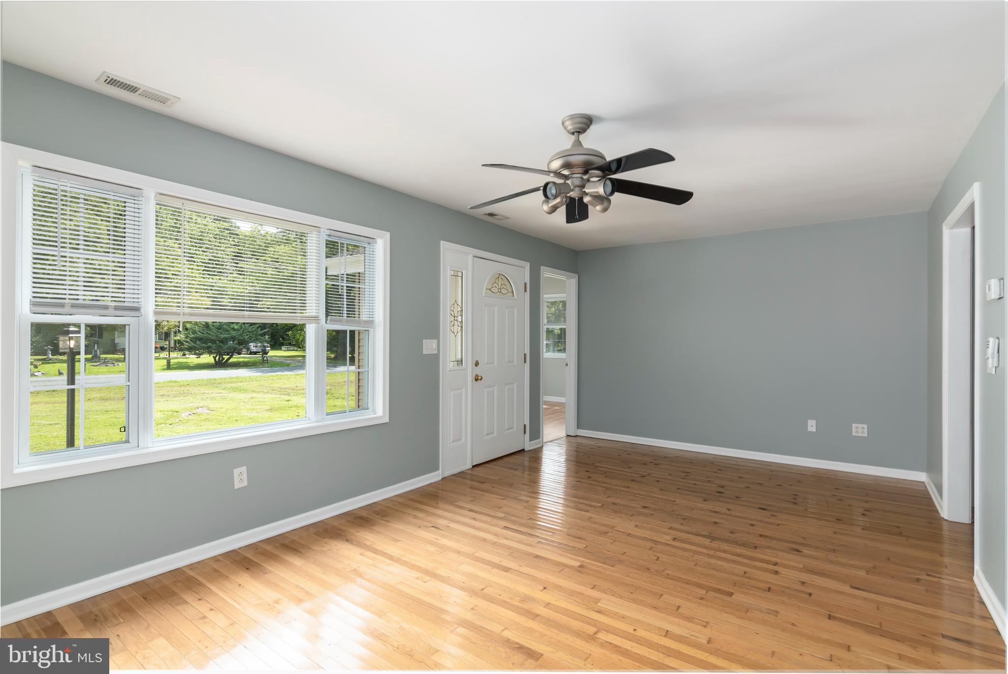 6824 Hopkins Neck Road Easton, MD 21601 - Photo 17 of 45 a view of an empty room with a window