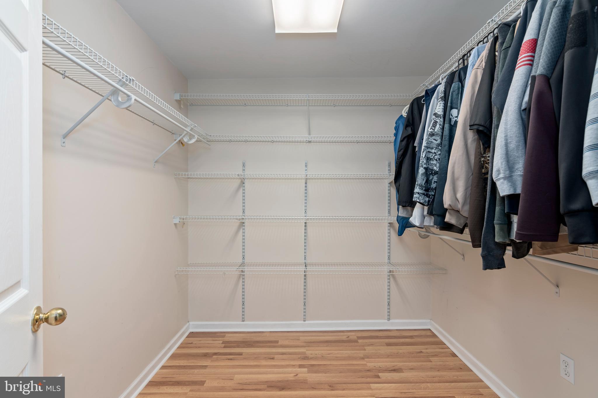 6824 Hopkins Neck Road Easton, MD 21601 - Photo 22 of 45 a view of a walk in closet