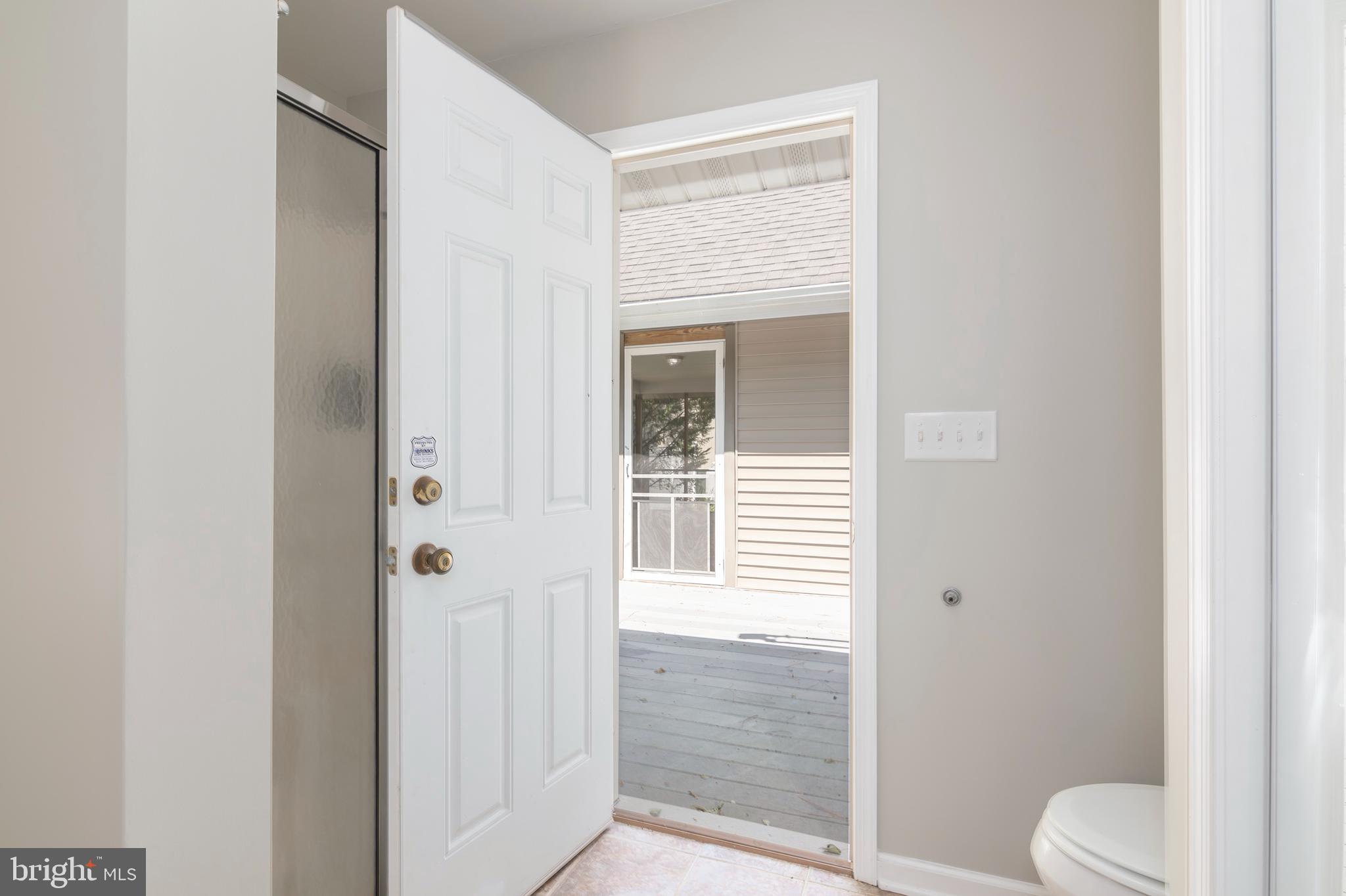 6824 Hopkins Neck Road Easton, MD 21601 - Photo 26 of 45 a bathroom with a toilet