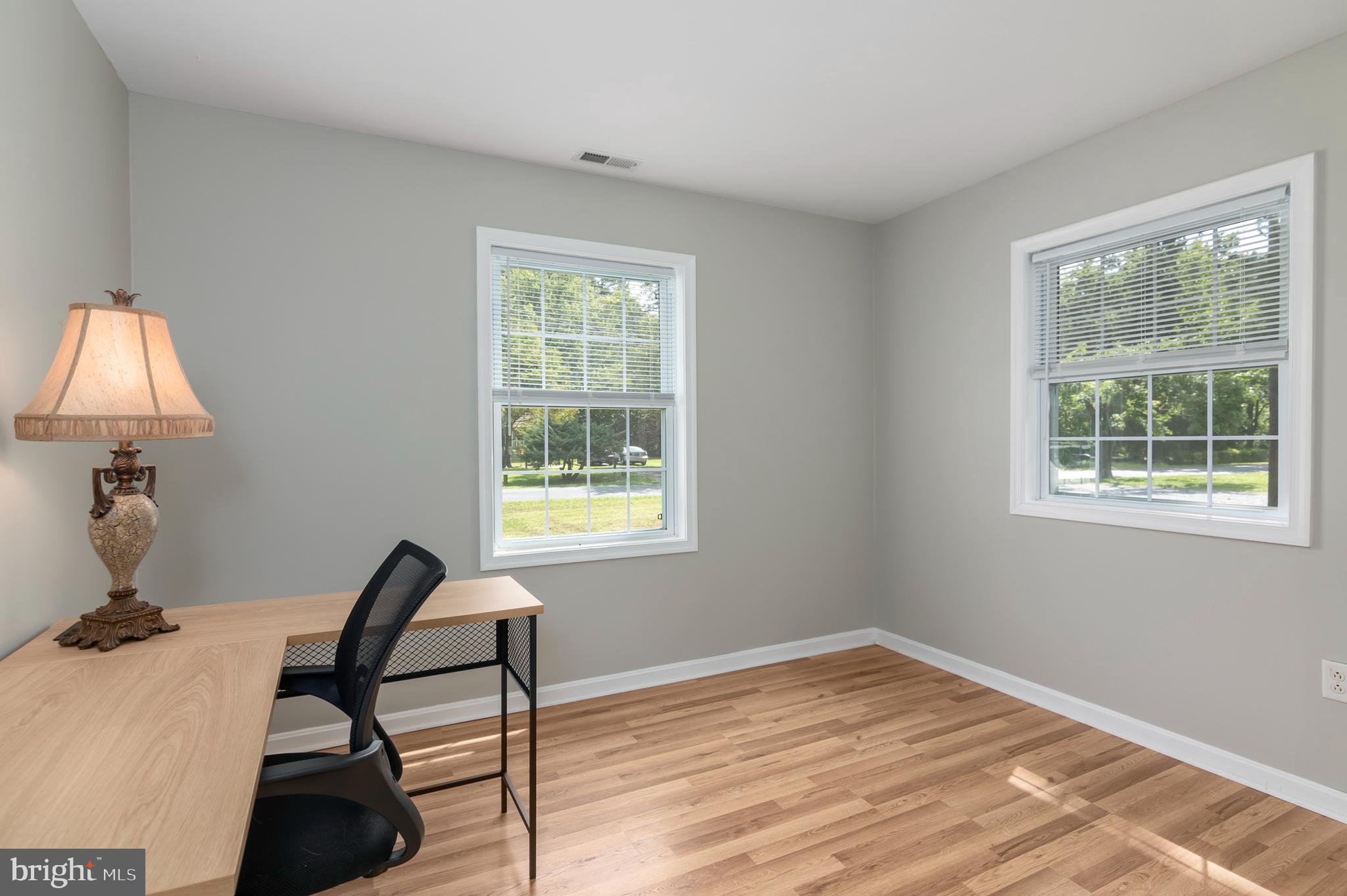 6824 Hopkins Neck Road Easton, MD 21601 - Photo 28 of 45 a workspace with furniture and window