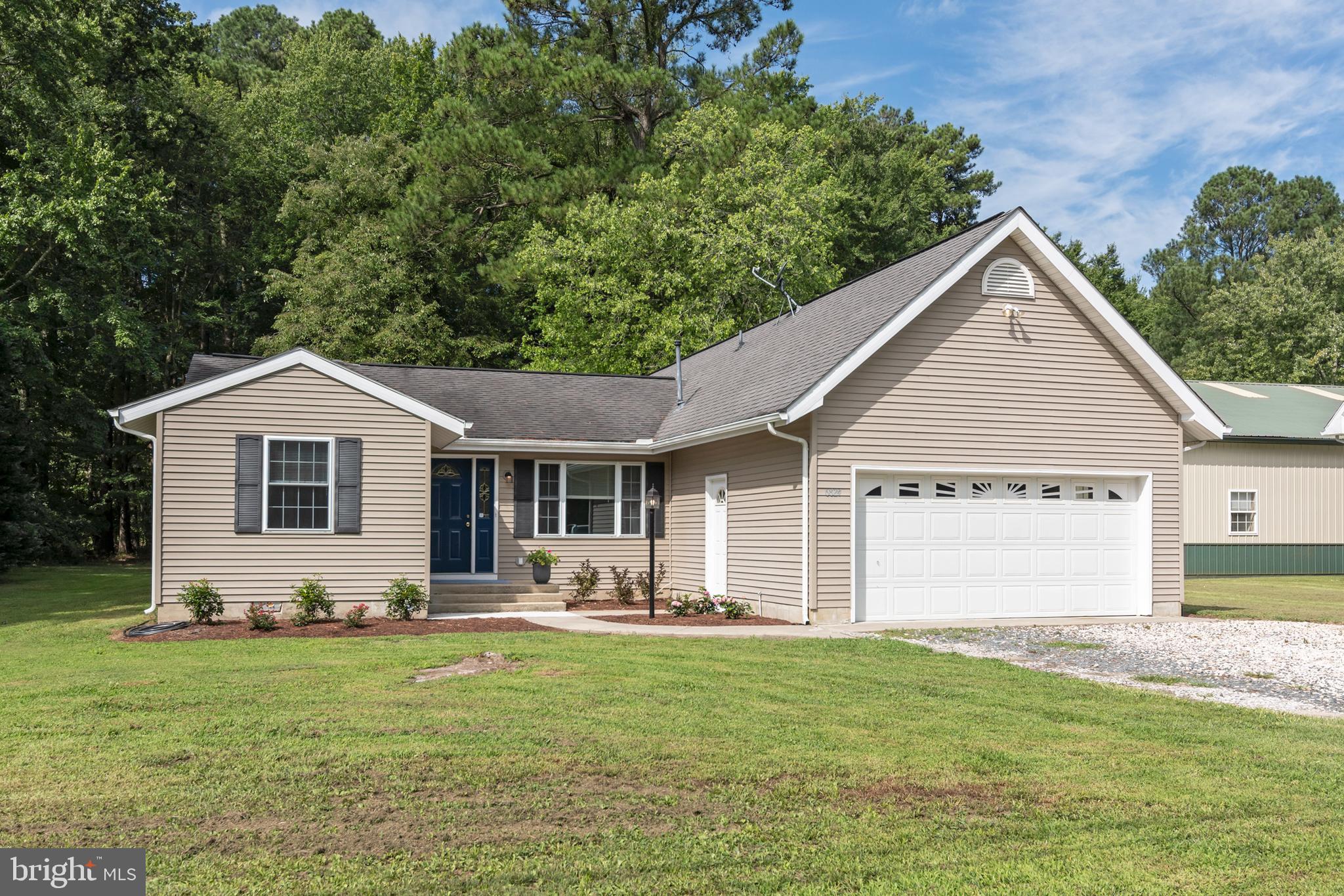 6824 Hopkins Neck Road Easton, MD 21601 - Photo 3 of 45 a front view of house with yard and green space