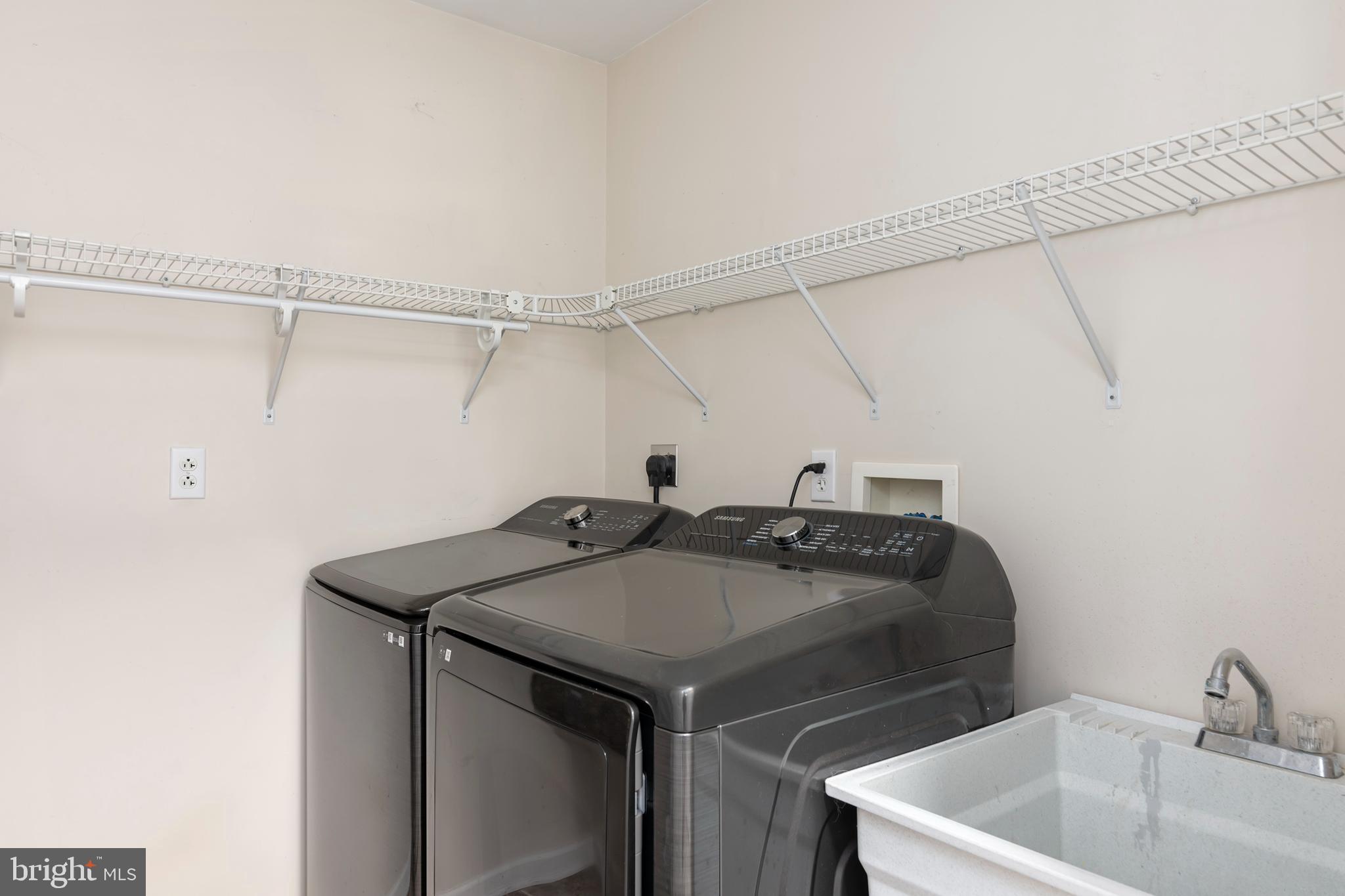 6824 Hopkins Neck Road Easton, MD 21601 - Photo 32 of 45 a utility room with dryer and washer