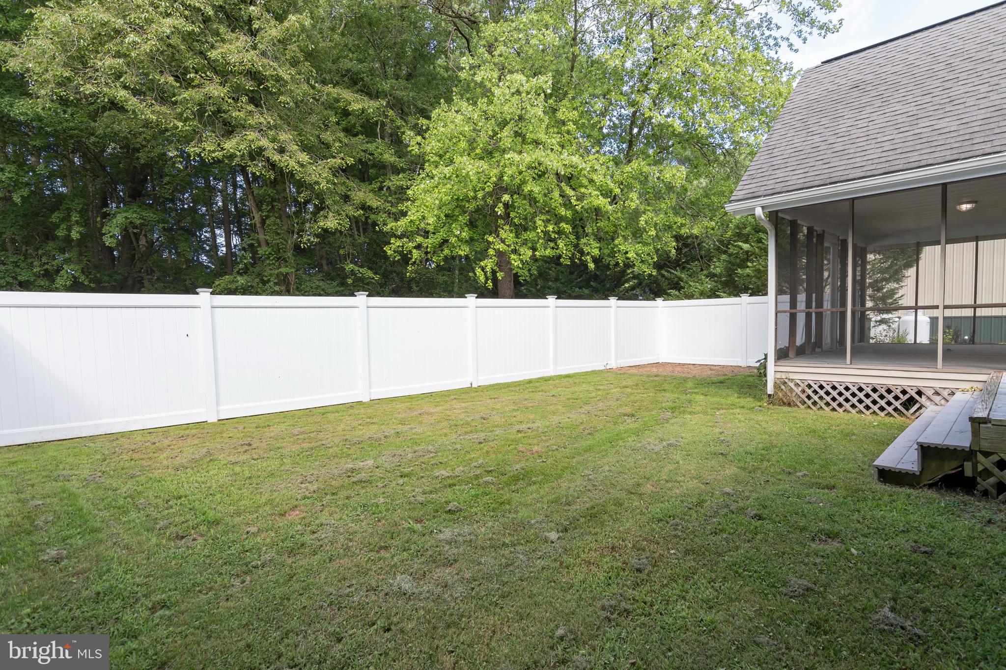 6824 Hopkins Neck Road Easton, MD 21601 - Photo 38 of 45 a view of a backyard with garden