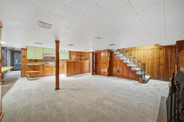 a view of an empty room with a balcony