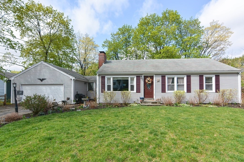 38 Spring Street Plainville, MA 02762 - Photo 1 of 23 a view of a house with a yard and sitting area