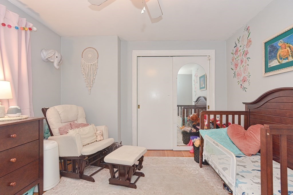 38 Spring Street Plainville, MA 02762 - Photo 13 of 23 a living room with furniture and a chair