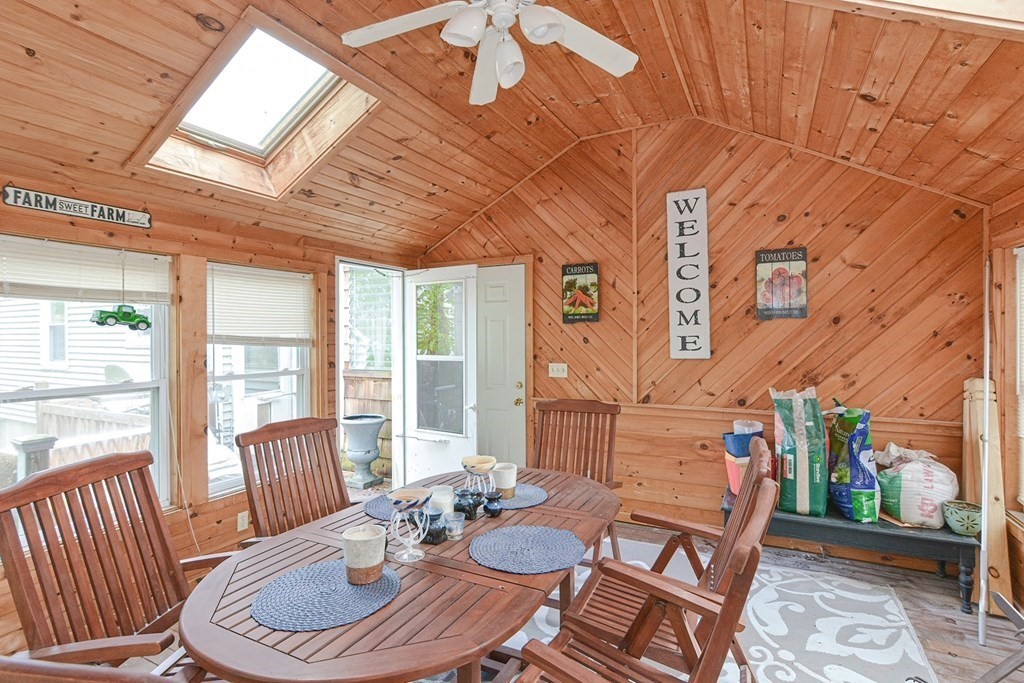 38 Spring Street Plainville, MA 02762 - Photo 18 of 23 a dining room with furniture a rug and wooden floor