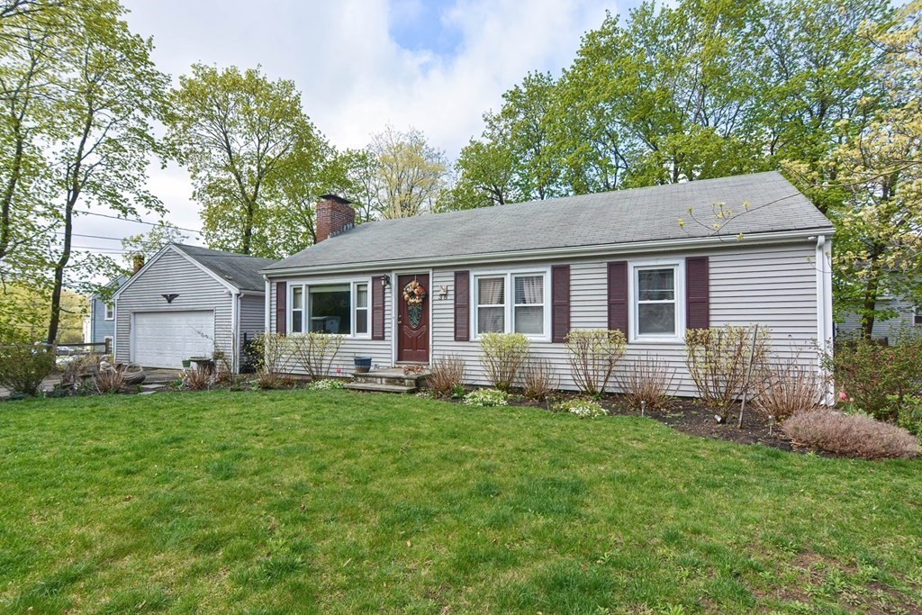 38 Spring Street Plainville, MA 02762 - Photo 21 of 23 a front view of a house with a garden