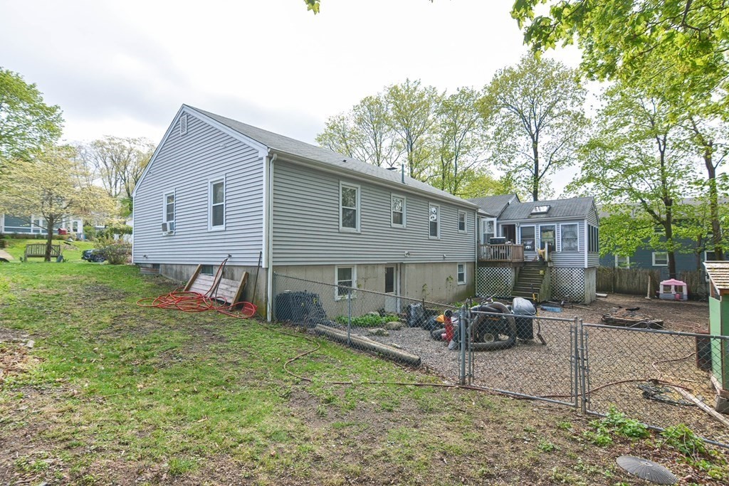 38 Spring Street Plainville, MA 02762 - Photo 22 of 23 a view of a house with backyard and sitting area