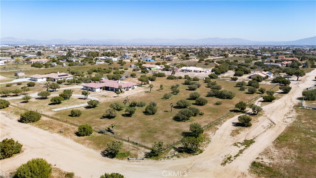 0 Lassen Road Oak Hills, CA 92344 - Photo 4 of 17 an aerial view of a residential houses with city view