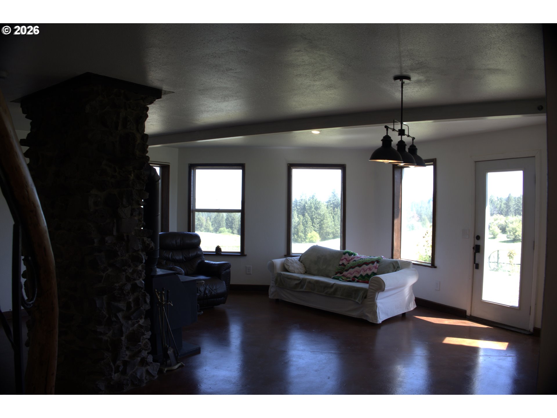 55821 Wildhorse Road Weston, OR 97886 - Photo 8 of 33 a living room with furniture and a large window