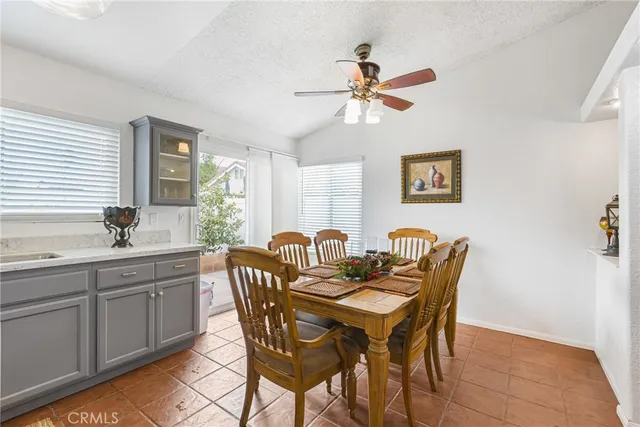 a view of a dining room and a table and chairs