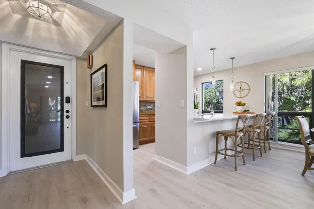 a view of a livingroom with furniture and window