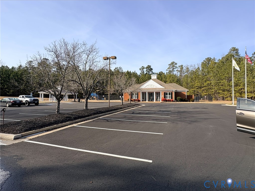 13619 Brandy Oaks Road Chesterfield, VA 23832 - Photo 25 of 28 a view of street with houses and trees in the background