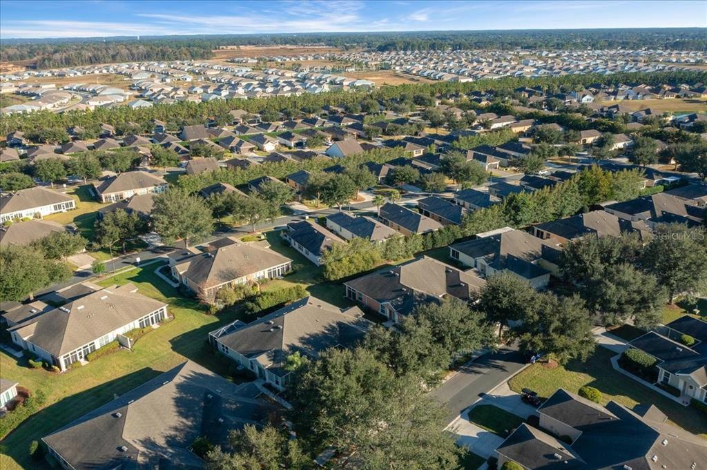 9586 Southwest 70th Loop Ocala, FL 34481 - Photo 21 of 21 an aerial view of multiple house