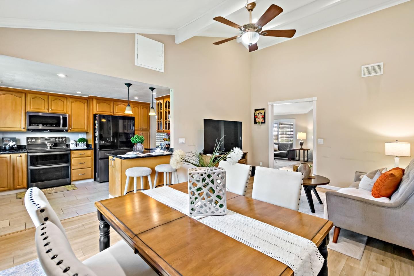 2831 Riedel Road San Jose, CA 95135 - Photo 19 of 53 a living room with furniture kitchen view and a fireplace