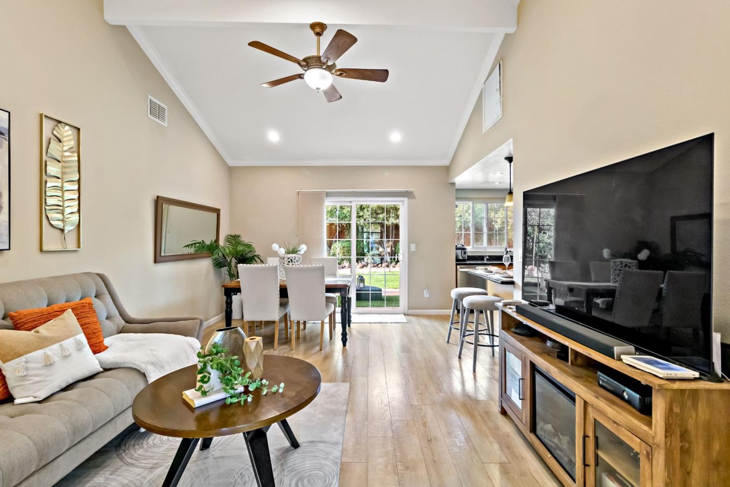 2831 Riedel Road San Jose, CA 95135 - Photo 21 of 53 a living room with furniture and a flat screen tv