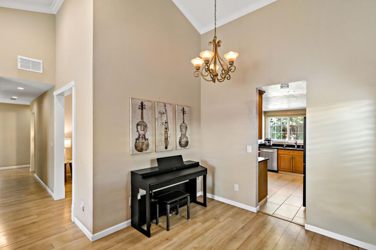 2831 Riedel Road San Jose, CA 95135 - Photo 24 of 53 a view of a hallway with wooden floor and staircase