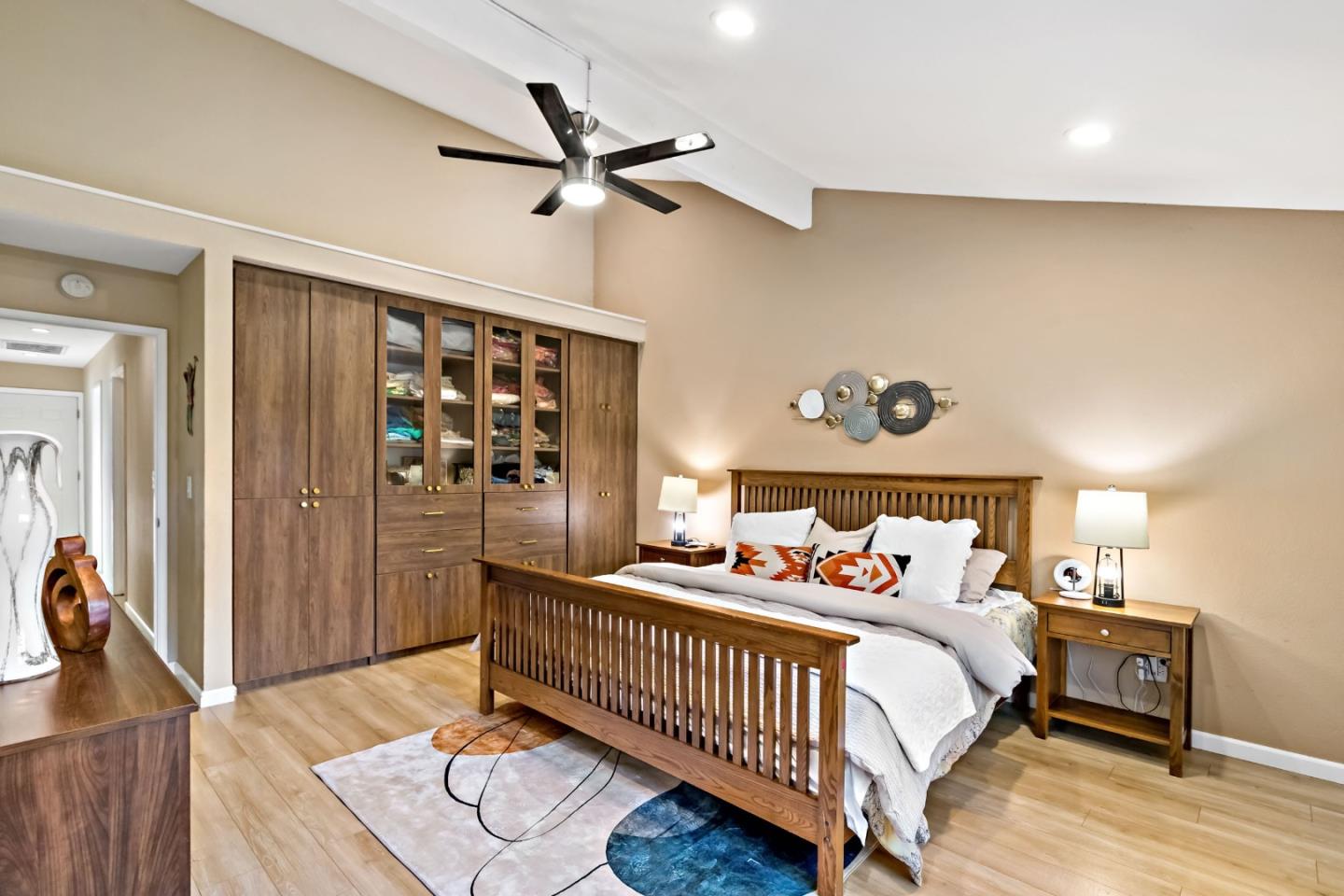 2831 Riedel Road San Jose, CA 95135 - Photo 26 of 53 a bedroom with a bed and a chandelier