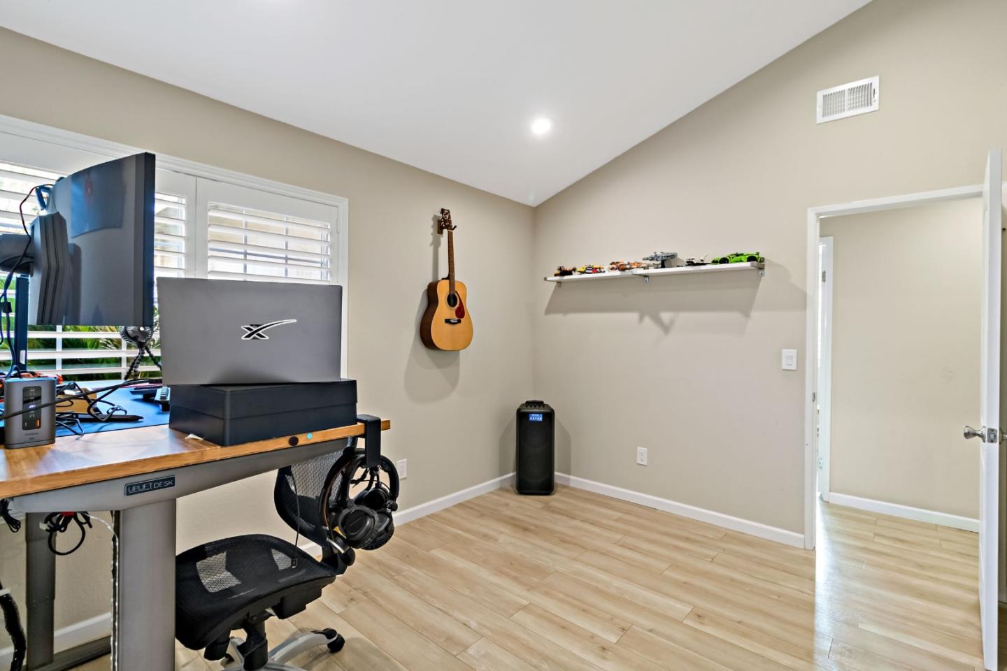 2831 Riedel Road San Jose, CA 95135 - Photo 34 of 53 a view of workspace with wooden floor windows gym equipment and windows