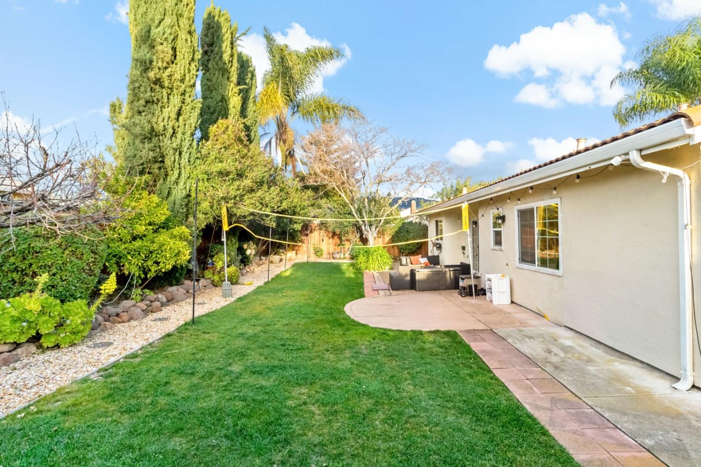 2831 Riedel Road San Jose, CA 95135 - Photo 42 of 53 a view of a backyard with table and chairs and potted plants