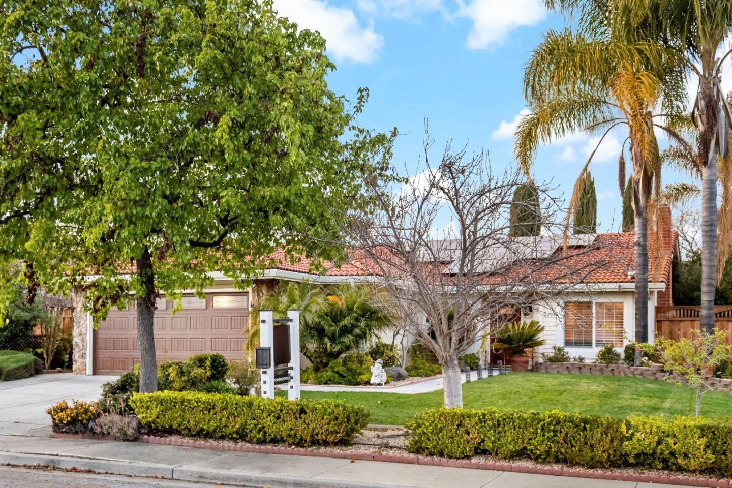 2831 Riedel Road San Jose, CA 95135 - Photo 10 of 53 front view of a building with a garden