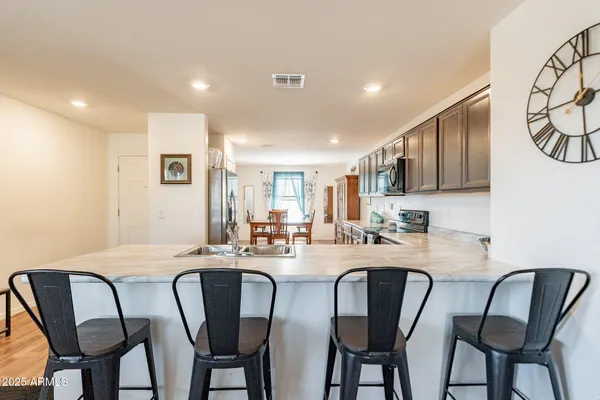 a view of a dining room with furniture