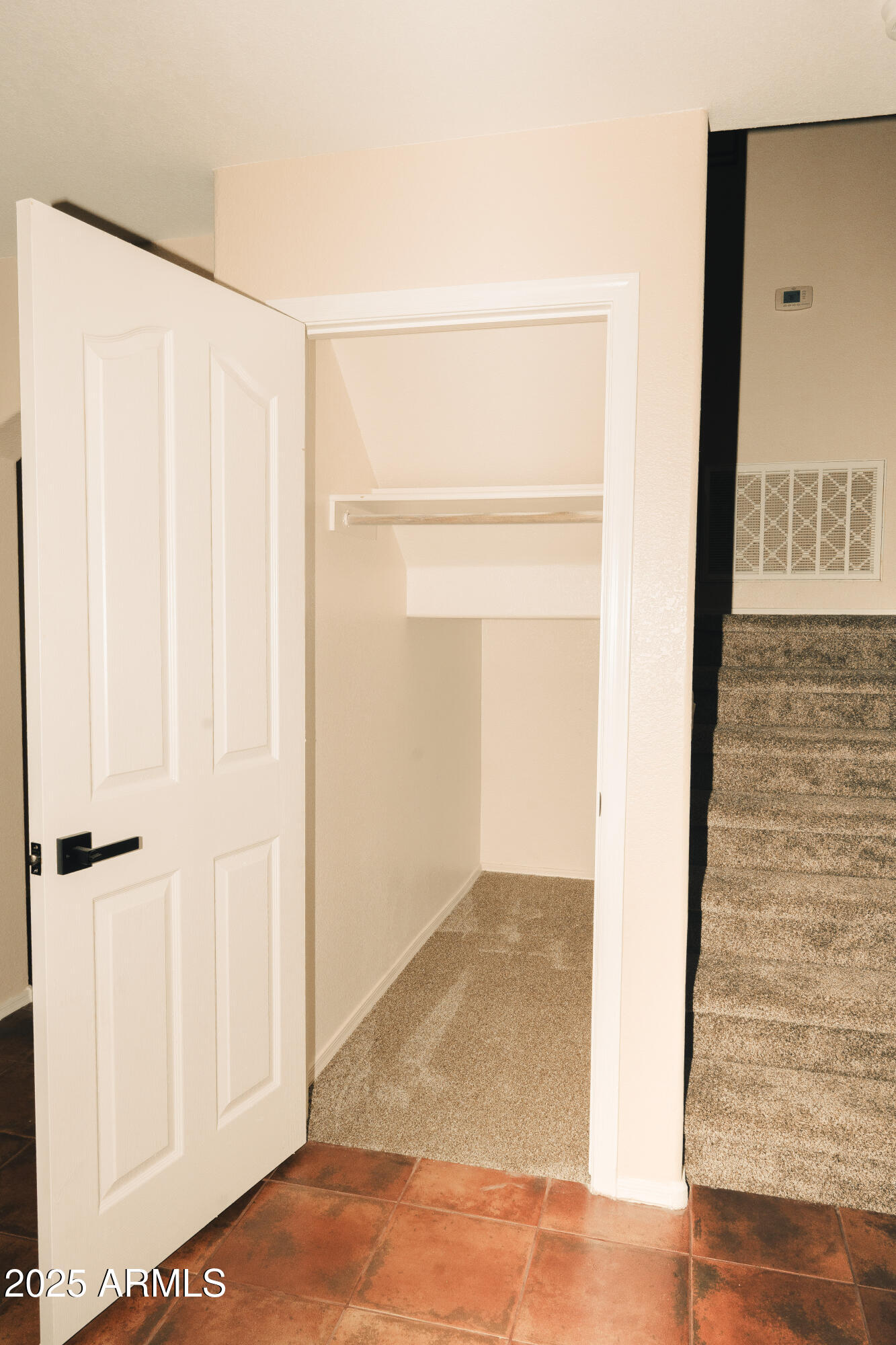 4705 East Jaeger Road Phoenix, AZ 85050 - Photo 12 of 44 a view of a small space with wooden floor