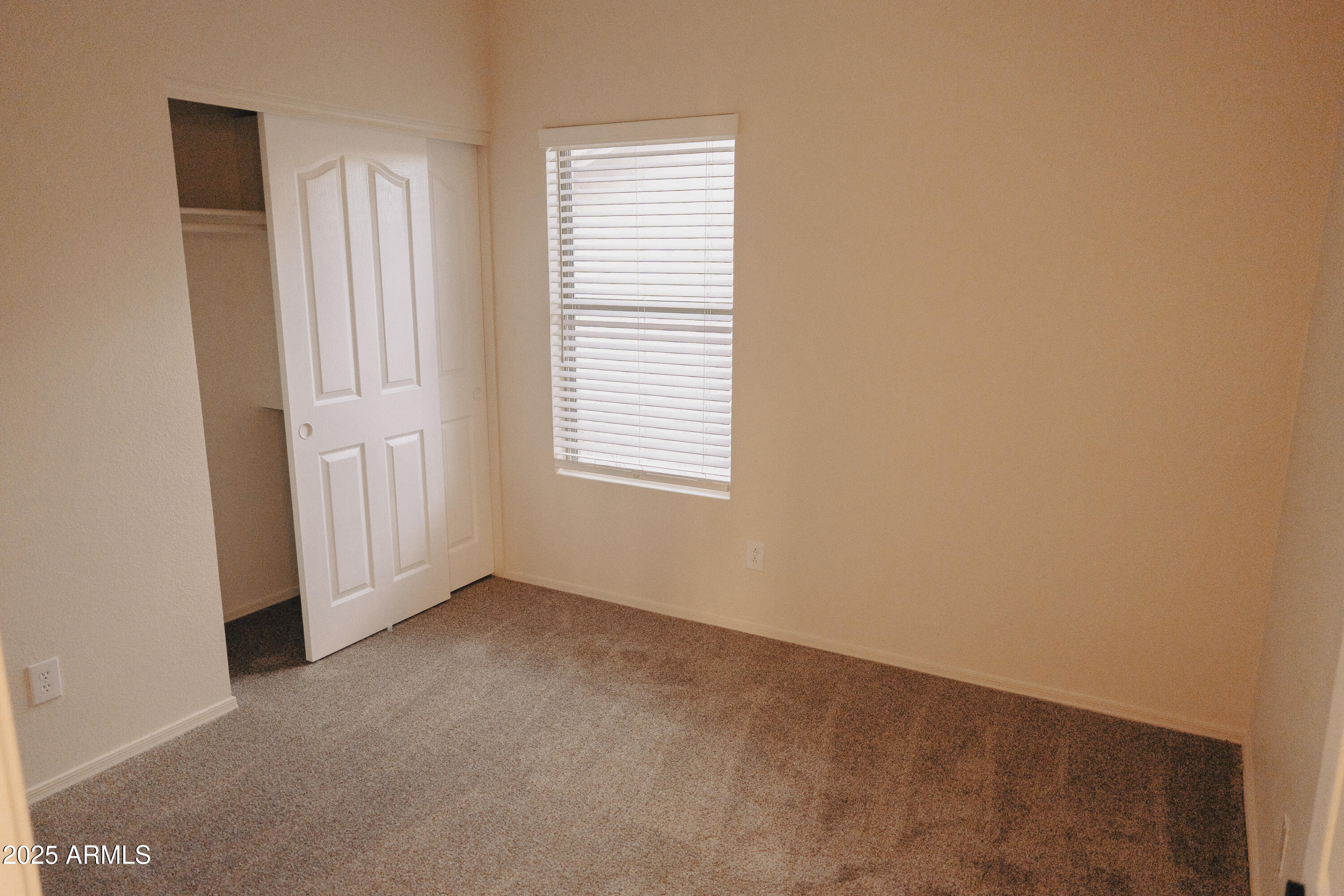 4705 East Jaeger Road Phoenix, AZ 85050 - Photo 25 of 44 an empty room with windows