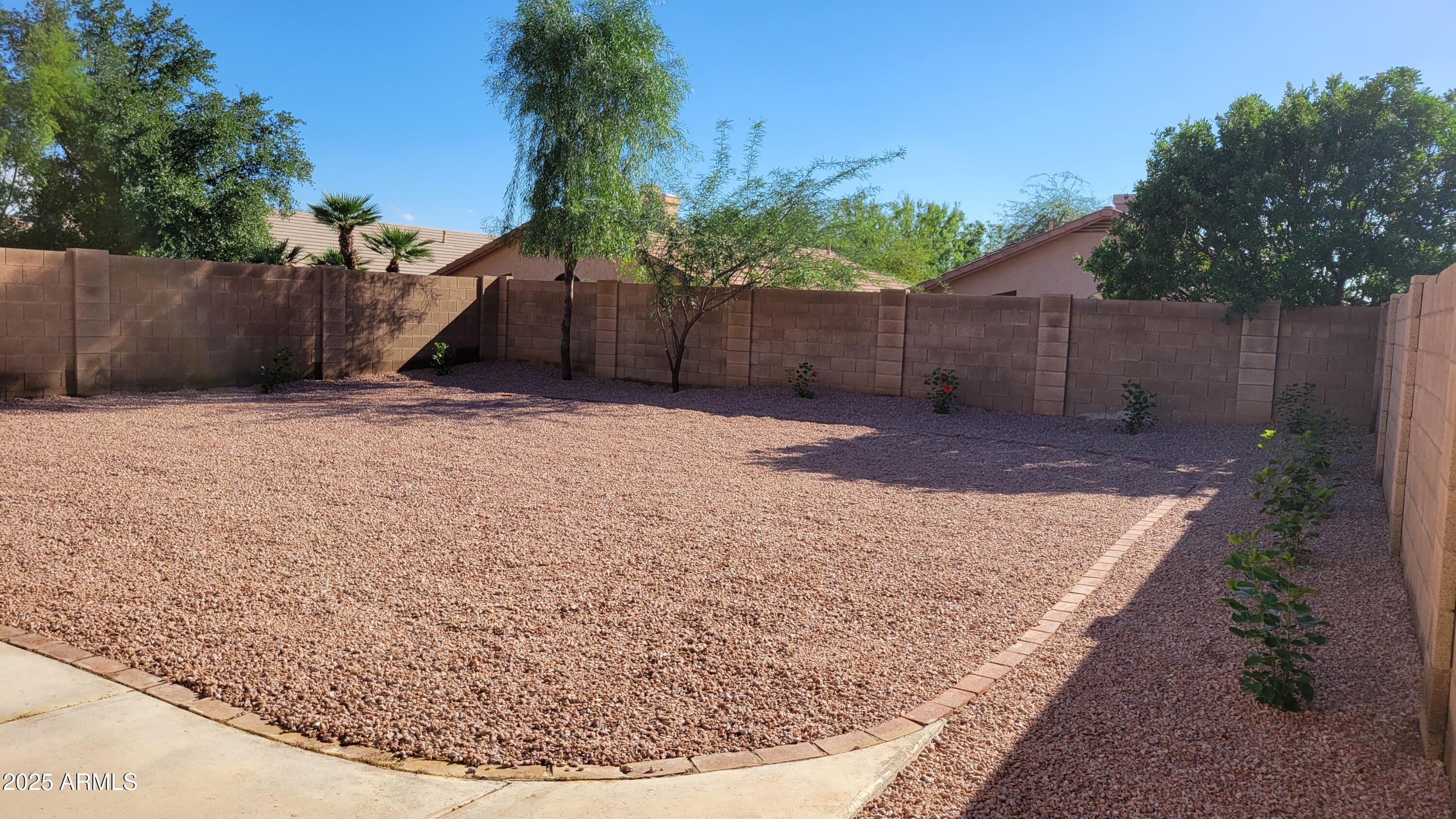 4705 East Jaeger Road Phoenix, AZ 85050 - Photo 29 of 44 a backyard of a house