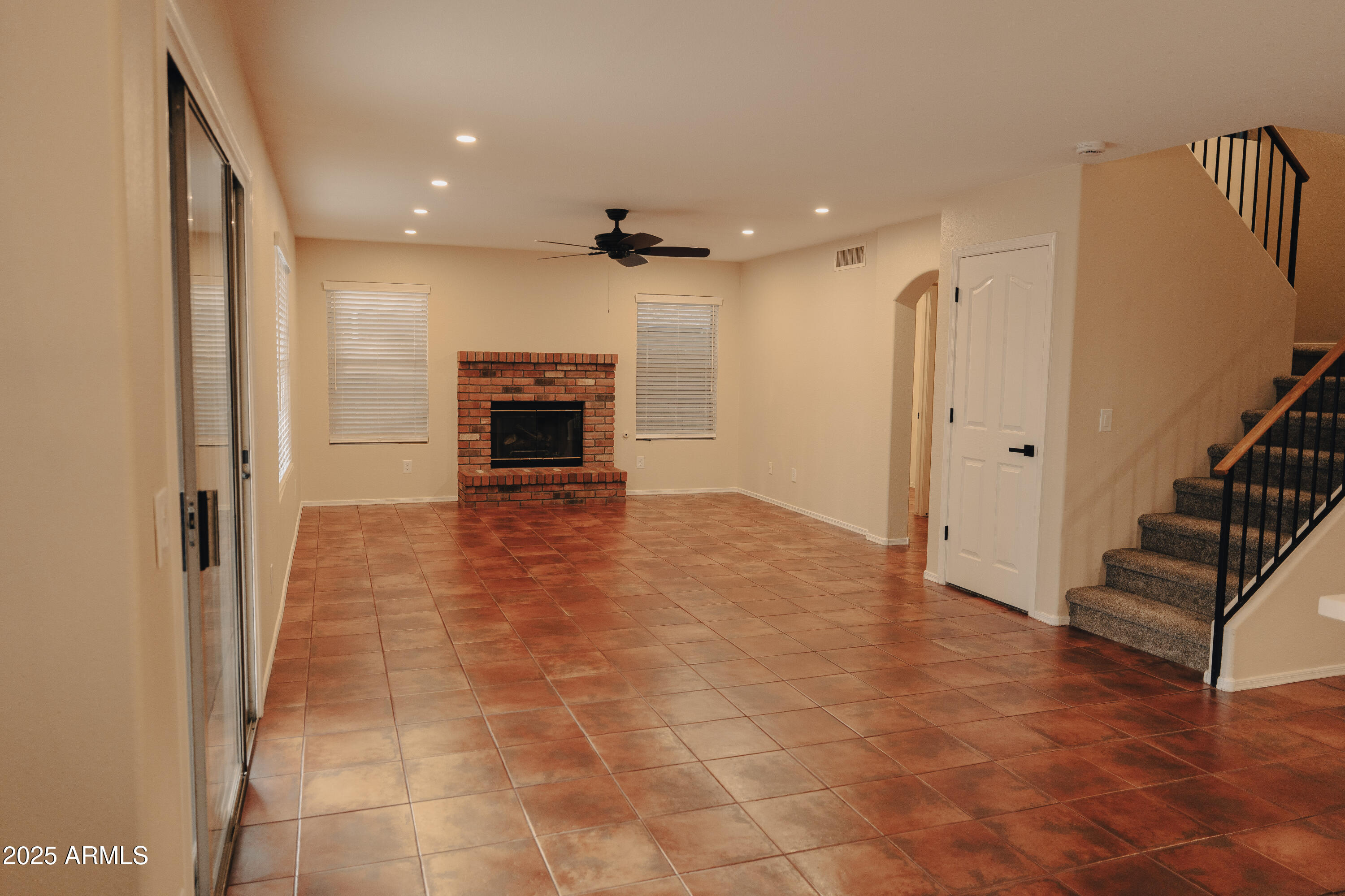4705 East Jaeger Road Phoenix, AZ 85050 - Photo 9 of 44 a view of an empty room with a fireplace