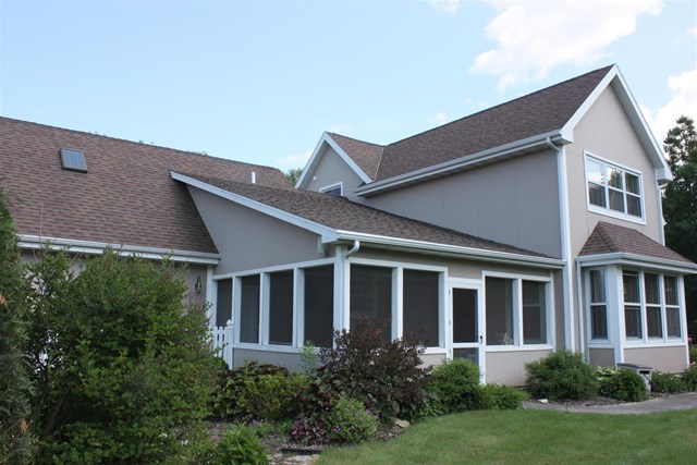4423 Walker Road Sturgeon Bay, WI 54235 - Photo 25 of 47 Screened in porch with dog run