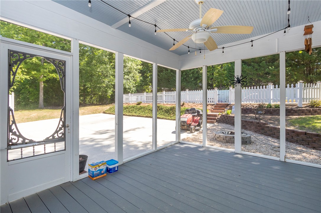 151 Hannah Circle Anderson, SC 29621 - Photo 33 of 46 Relax in this screened porch with views of the expansive private yard.