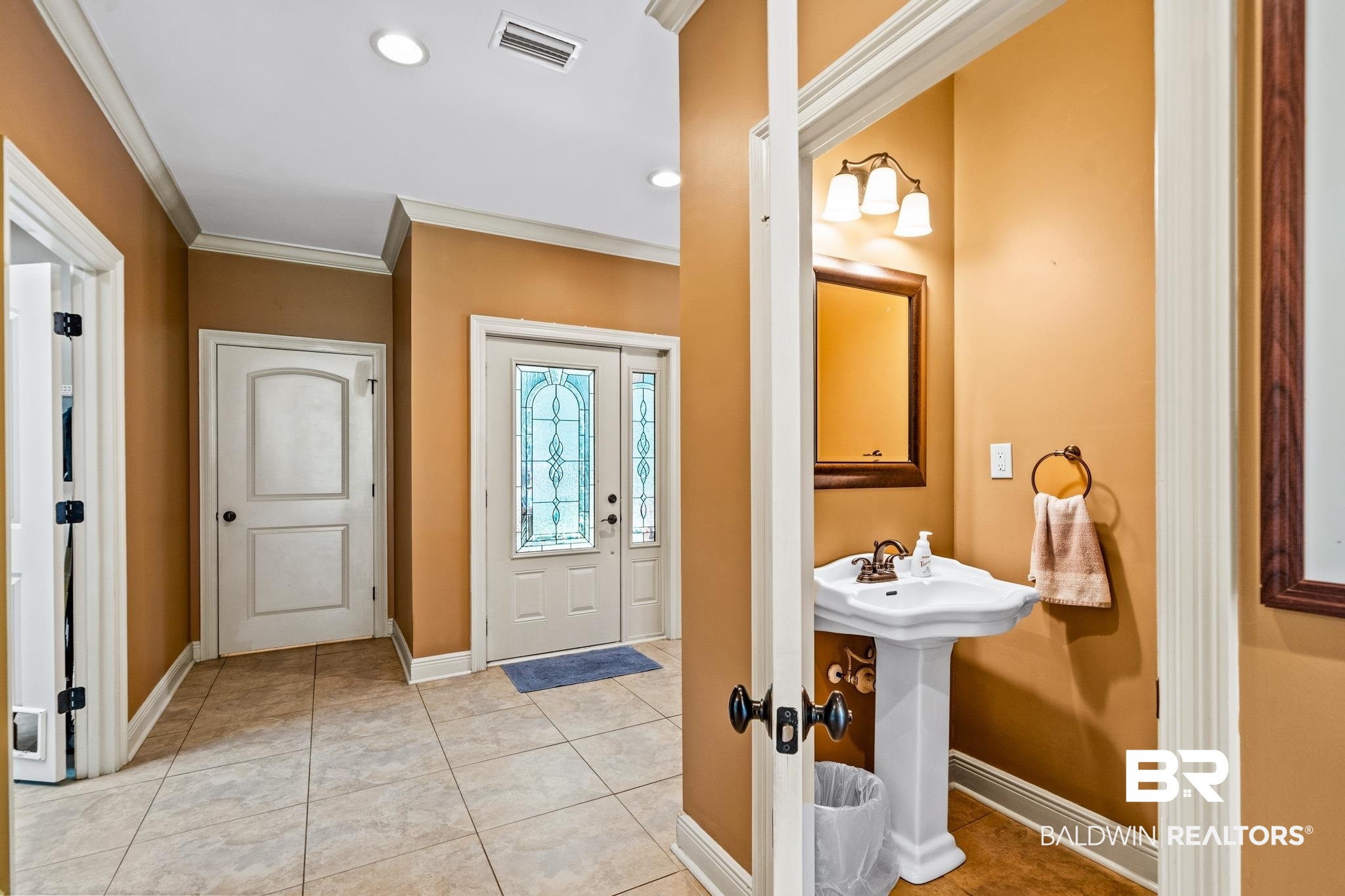 8321 Dixon Road Bay Minette, AL 36507 - Photo 37 of 79 Bathroom featuring ornamental molding and tile patterned floors