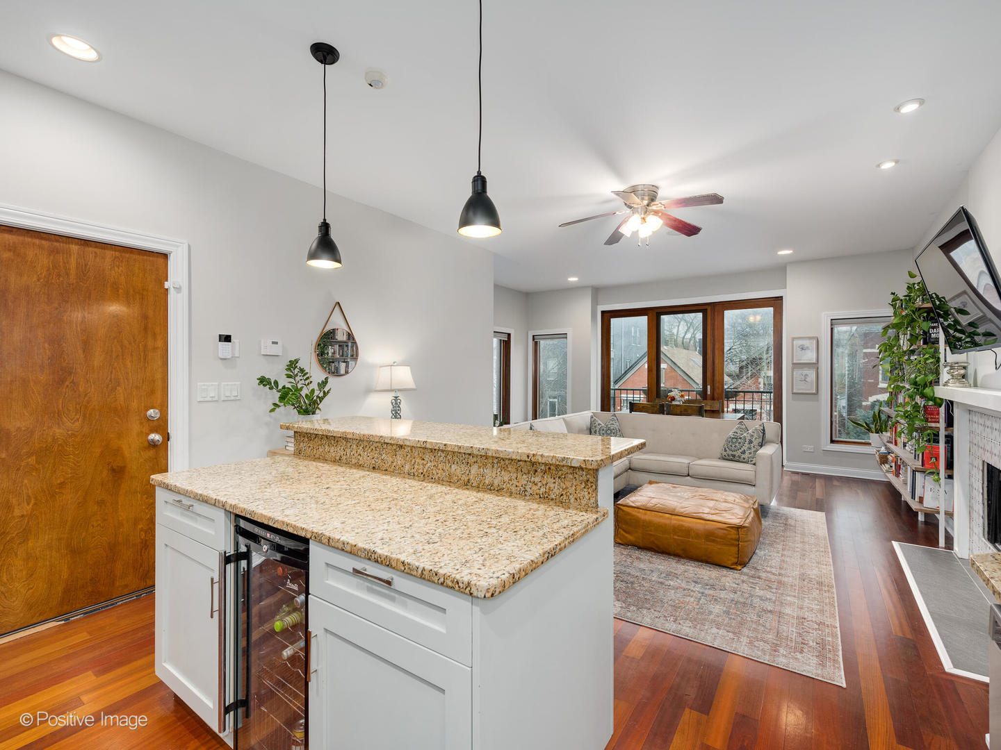 2033 West Crystal Street, Unit 2 Chicago, IL 60622 - Photo 14 of 22 a view of living room with granite countertop furniture and fireplace
