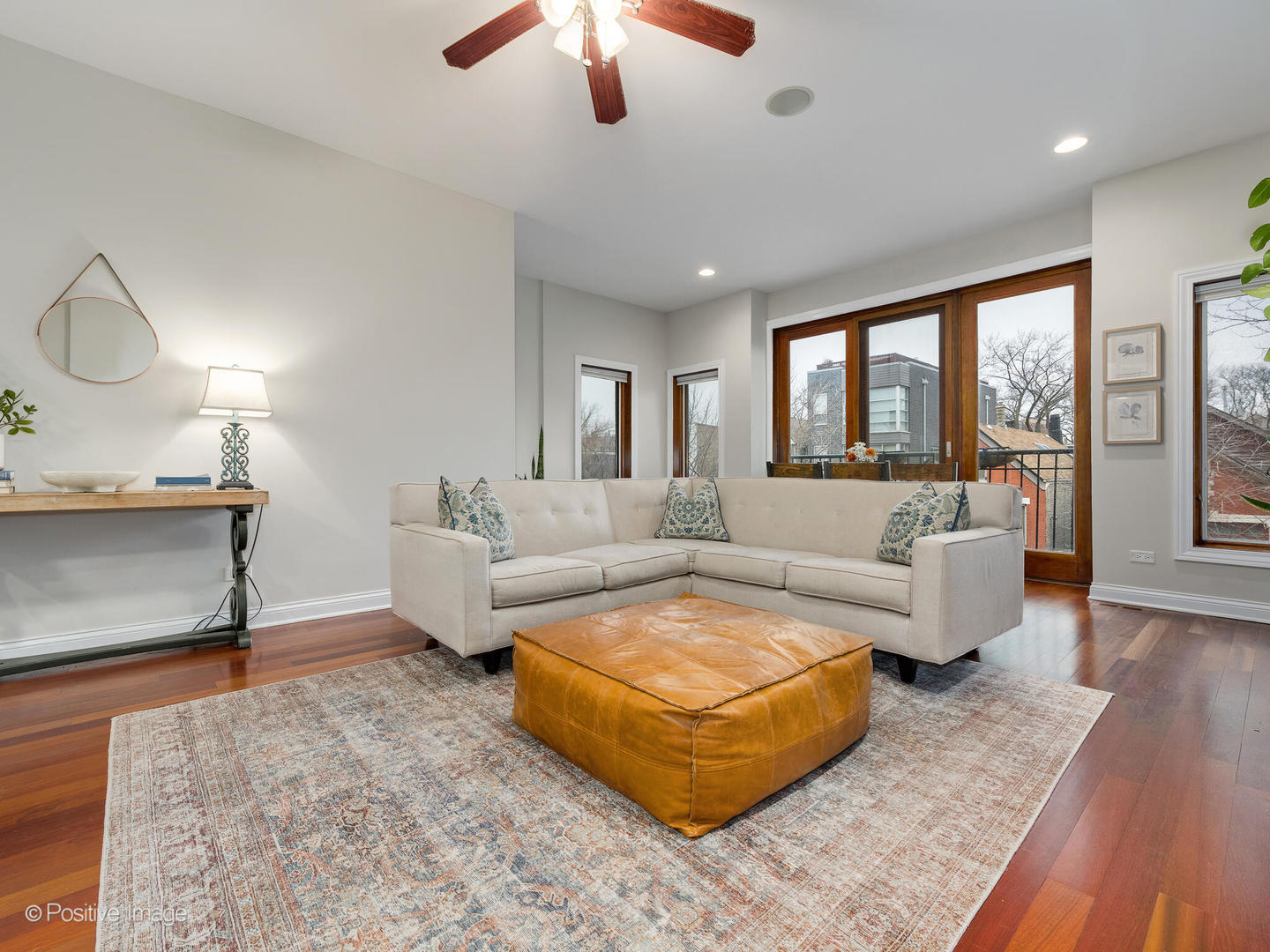 2033 West Crystal Street, Unit 2 Chicago, IL 60622 - Photo 4 of 22 a living room with furniture and a large window